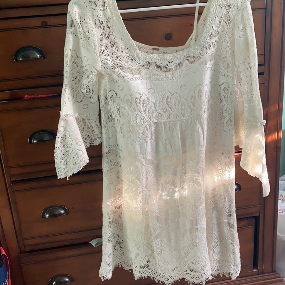 Beautiful ivory lace detailed free people dress, flowwy fringe sleeves